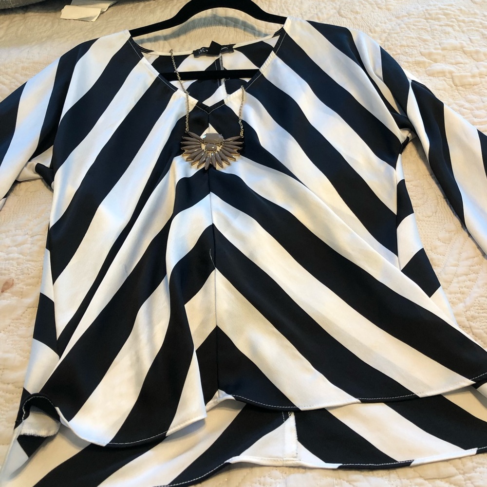 Black and white long sleeve blouse.